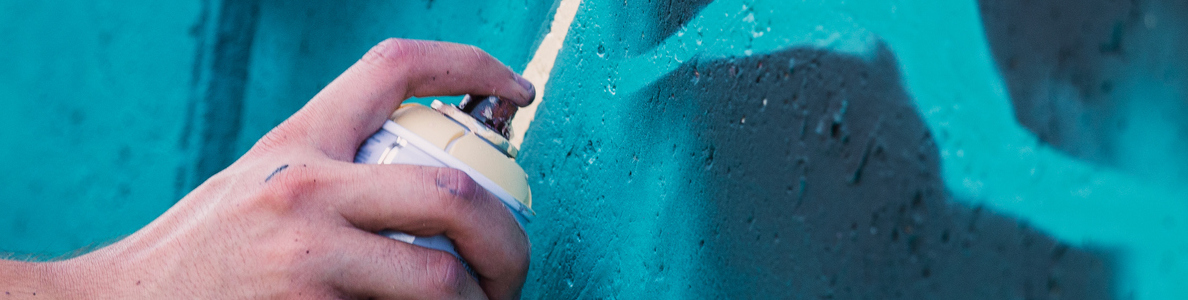 Spray painting a wall